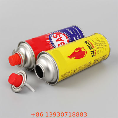 شیر اسپری اجاق گاز بوتان با درپوش قرمز برای پیک نیک و آشپزی روی میز