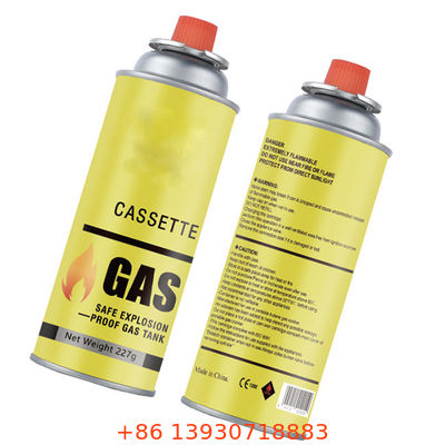 شیر اسپری اجاق گاز بوتان با درپوش قرمز برای پیک نیک و آشپزی روی میز